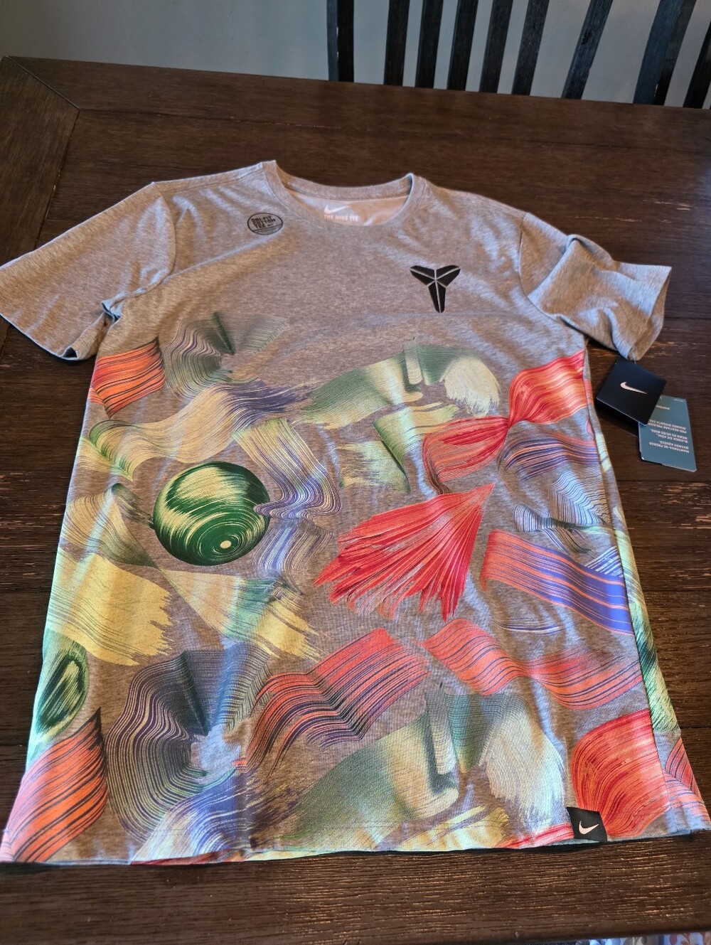 Nike Grey Short-Sleeve Graphic Training Tee with Multicolor Print
